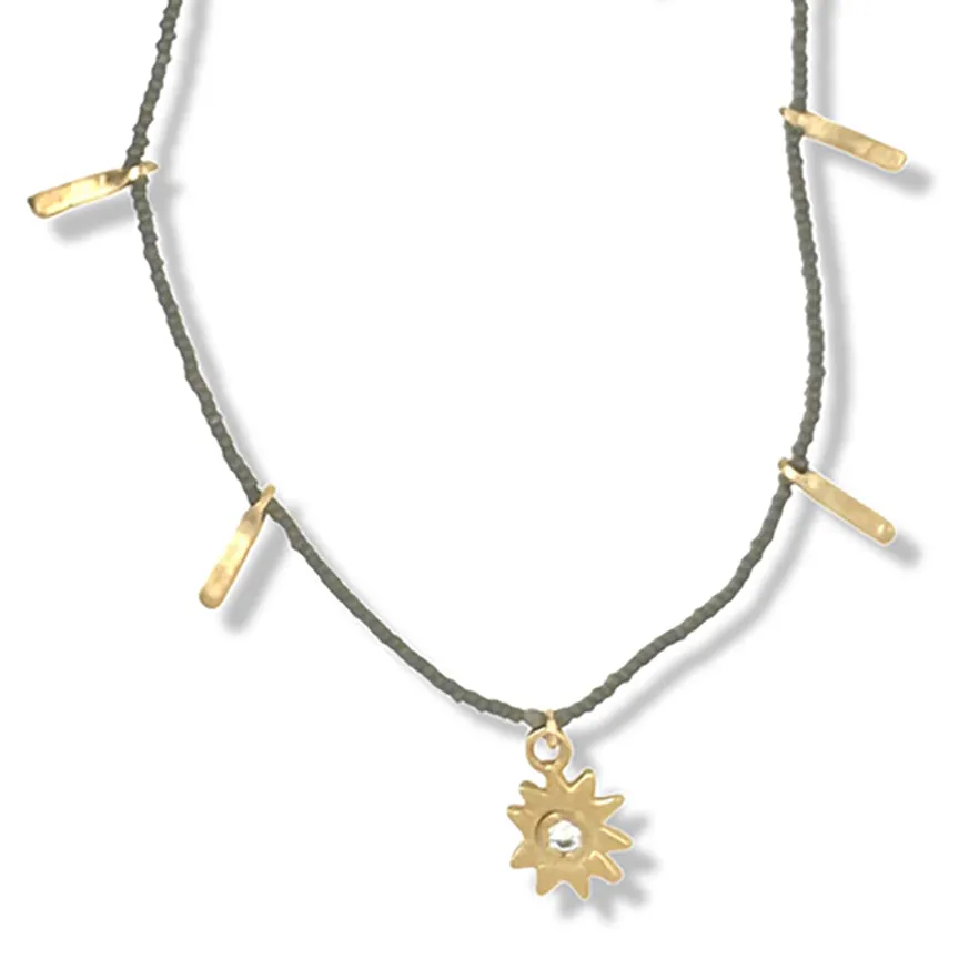 STAR FRINGE CHARM NECKLACE IN GOLD ON CHARCOAL BEADS